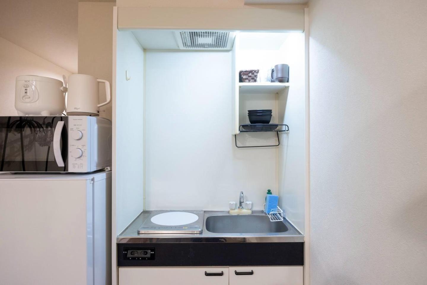 東京都Shinjuku Okada Buildingアパートメント エクステリア 写真